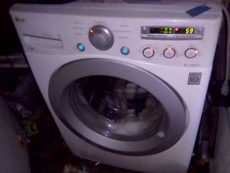 WASHER BIG TUBE FRONT LOADER LG WHITE ON WHITE WORKING EXCELLENT WITH 6 MONTH WARRANTY PRICE $250 DELIVERY/INSTALLATION INCLUDED