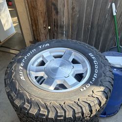 Gmc Oem stock rims and tires 265/70/17