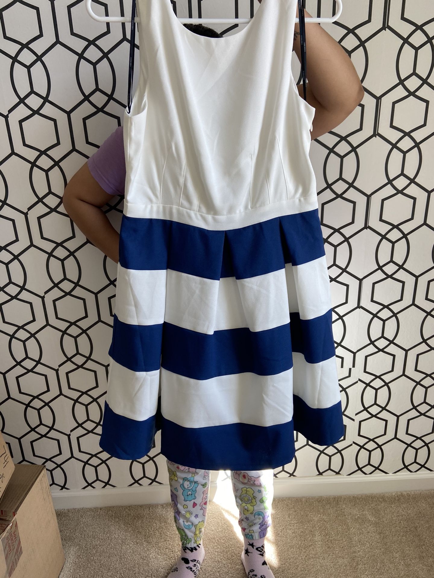 Woman’s Blue And White Dress