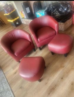 Two chairs with foot rest