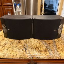 Bose speakers, ONYKO Receiver, Rock speakers, Hanging outdoor speakers and new 100ft speaker wire and various speaker selectors. Package deal.