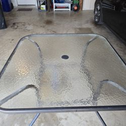 Glass Patio Table. 37 Inch Long, 29 Inch High