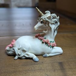 Unicorn with flower wreath