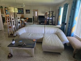 Couch with lounger in bone colored leather