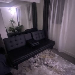 Black Futon w/ USB charger and cup holder middle console