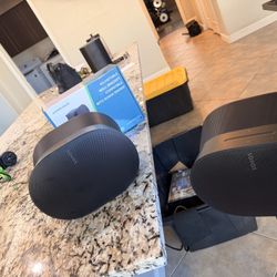 Two Sonos Era 300S With Walls Mounts And One Stand