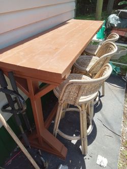 Outdoor table with 3 bamboo barstools cash only