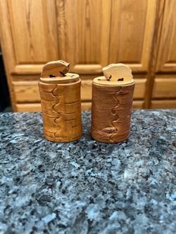 Vintage Wood Hand Birch Bark Texture made pair of Salt and pepper Shakers.  The top has hand carved bears.  Size 3 1/4 inches tall.  Preowned never us