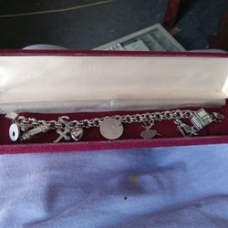 Sterling Silver Charm Bracelet With 9 Charms
