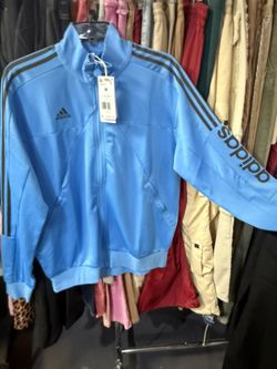 The jacket is a Men's Adidas Tiro 23 Wordmark Jacket in the color scheme "Semi Blue/black Size M New 