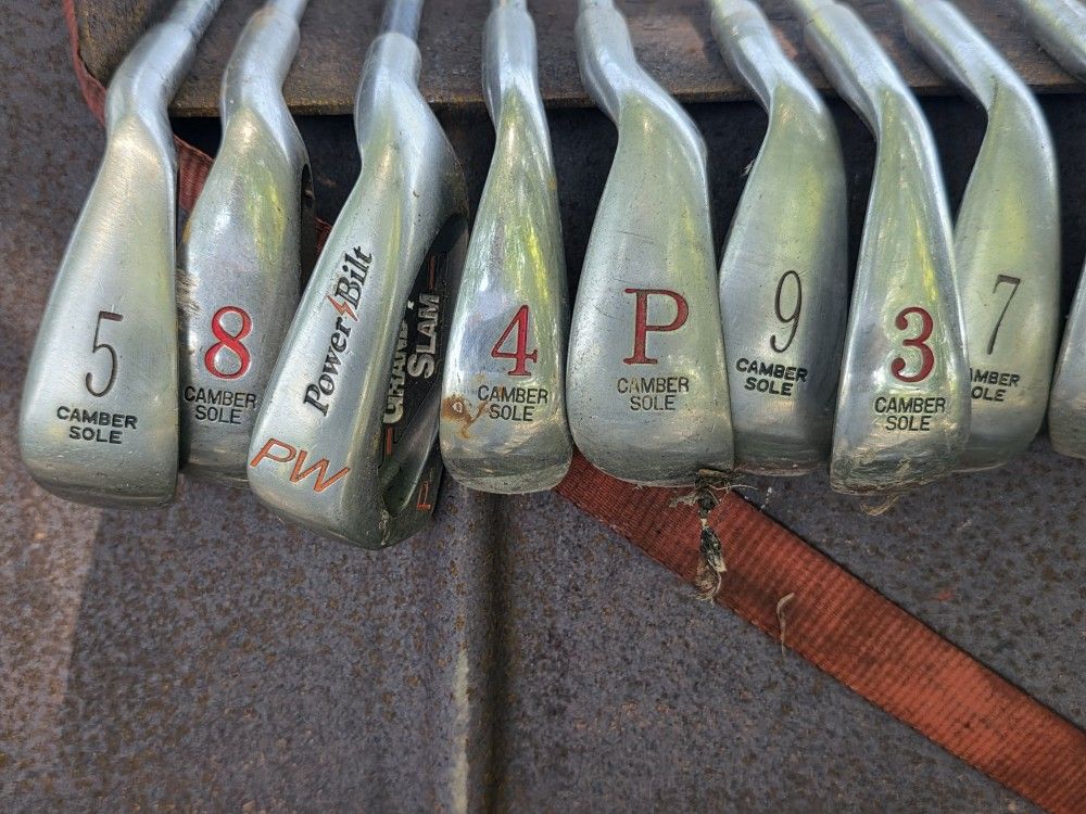 Assortment Of Golf Clubs