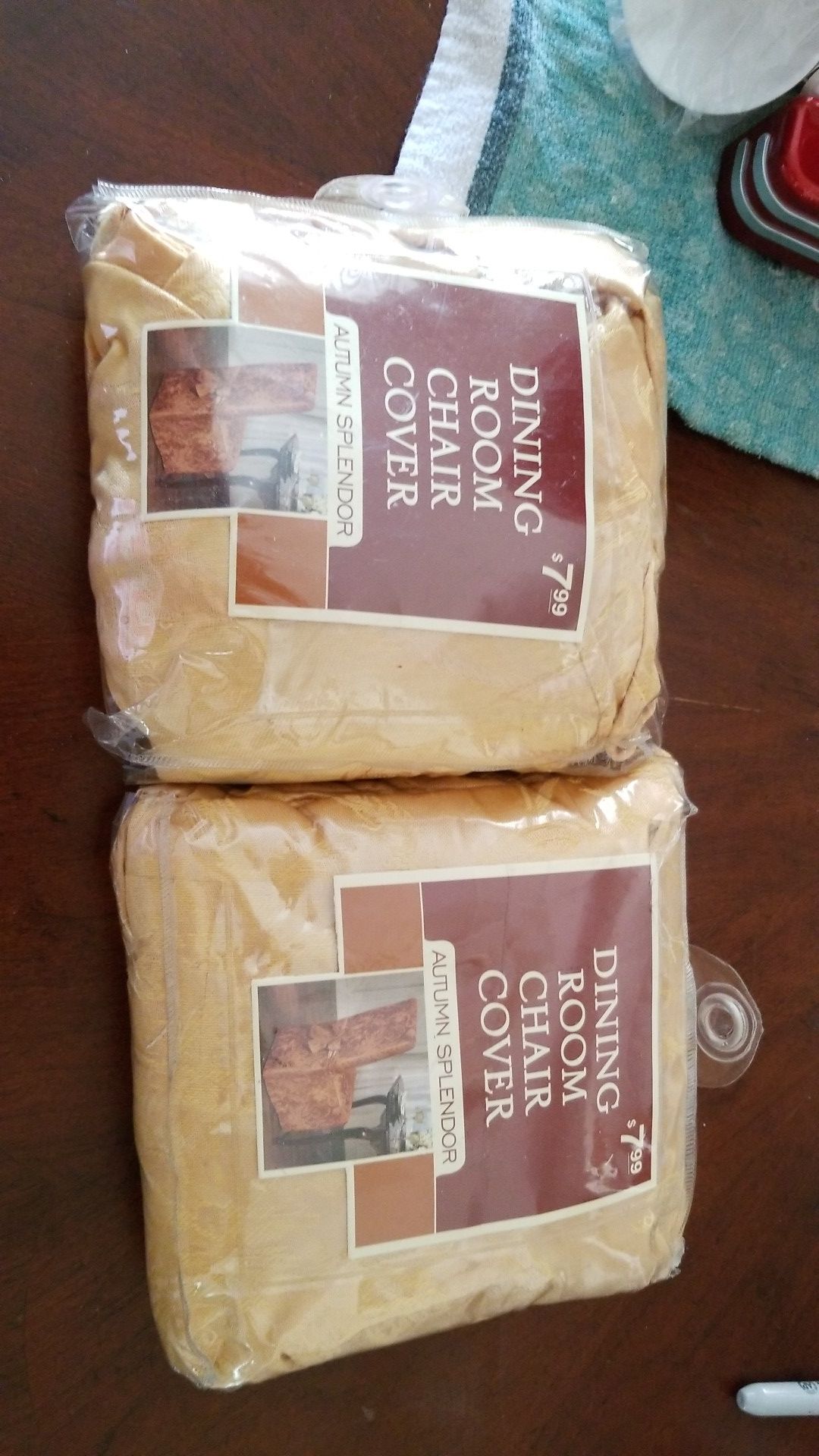 Dining Room chair covers brand new package, I have 2 for $8.00 complete