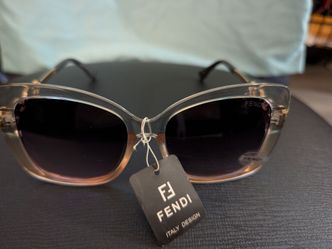1 NEW PAIR OF SUNGLASSES