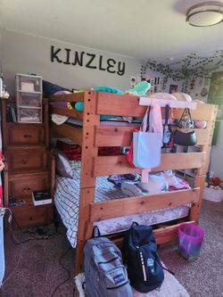 Full Size bunk bed with drawer stairs and drawers under the bed. Mattress included.