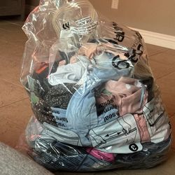 Bag filled with womens clothes