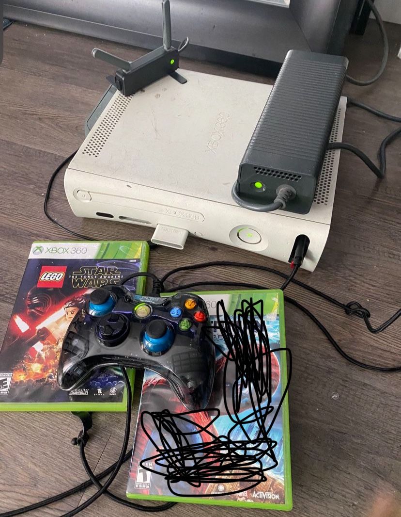 xbox 360 with 7 games, wi-fi adapter, and 2 storage devices