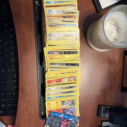 Tin box full of random Pokémon cards(make an offer)