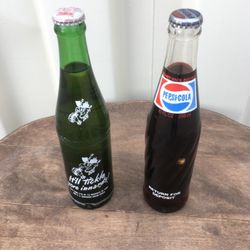 Old Pepsi and Mountain Dew bottles.