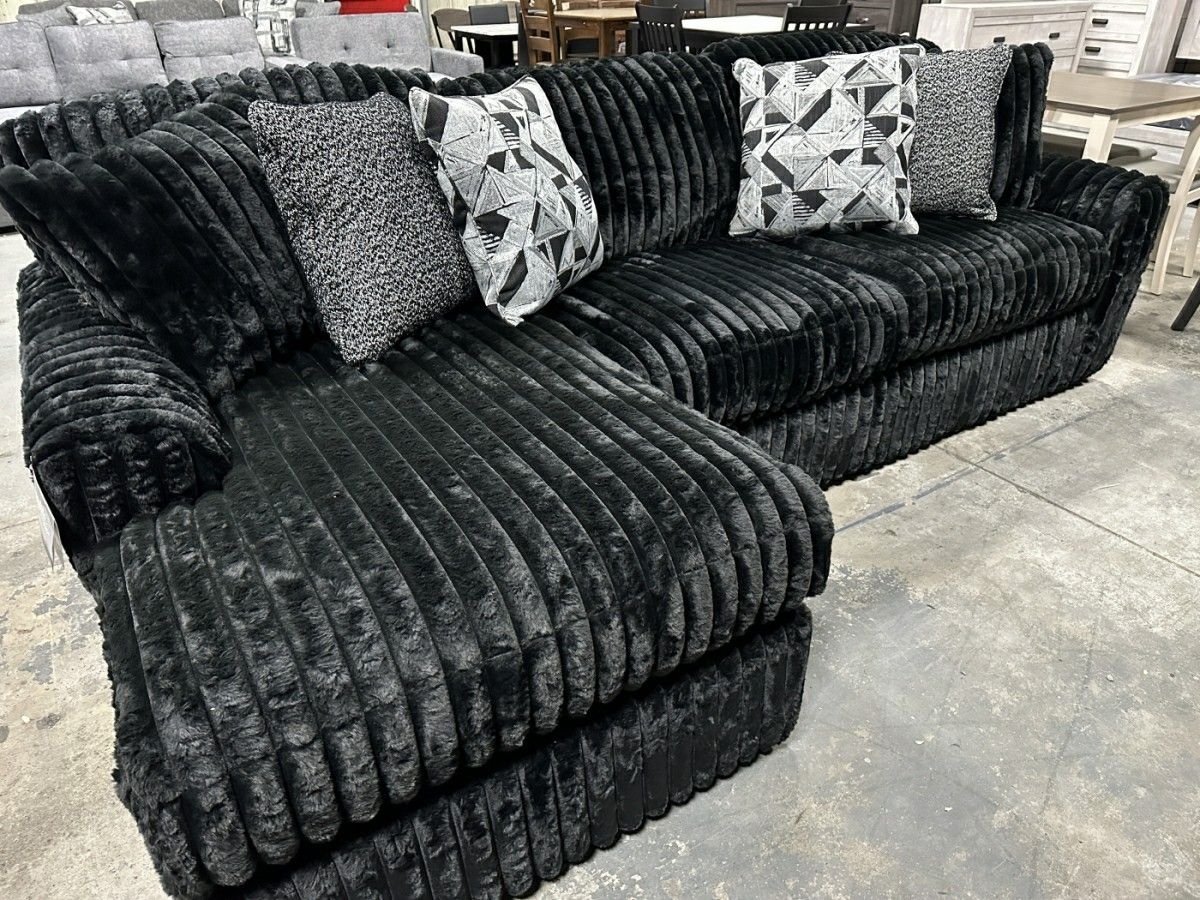 Black Sectional with Chaise and Pillows