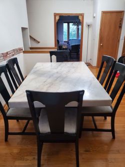 Dinner table with chairs