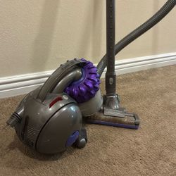 This is a Dyson DC46 Motorhead Canister Vacuum Cleaner.