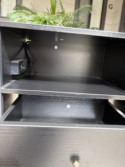 Dark Wood Nightstand with Open Shelves