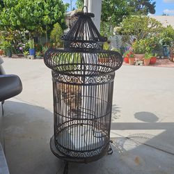 Huge Solid Wrought iron birdcage 5 feet tall a little over 2 feet wide very heavy