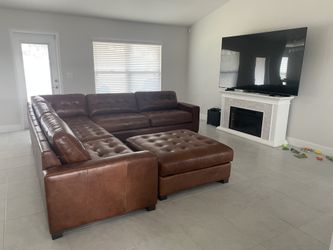 4-Piece Leather Sectional & Ottoman + Pillows, Throw and Care Kits