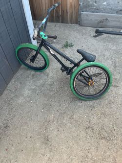 Green and black bmx