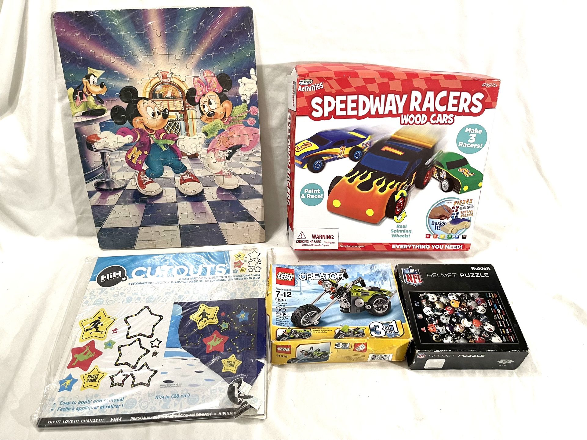 Brand New Different Items, Kids Toys, And Hobbies. Brands Include. (Legos, Rose Art Activities, Riddell Puzzles, Mickey Mouse Puzzle & HIH Cutouts.) 