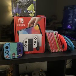 Nintendo Switch Oled Bundle!! 8 Games, 4 Joycons And 1 Pro Controller