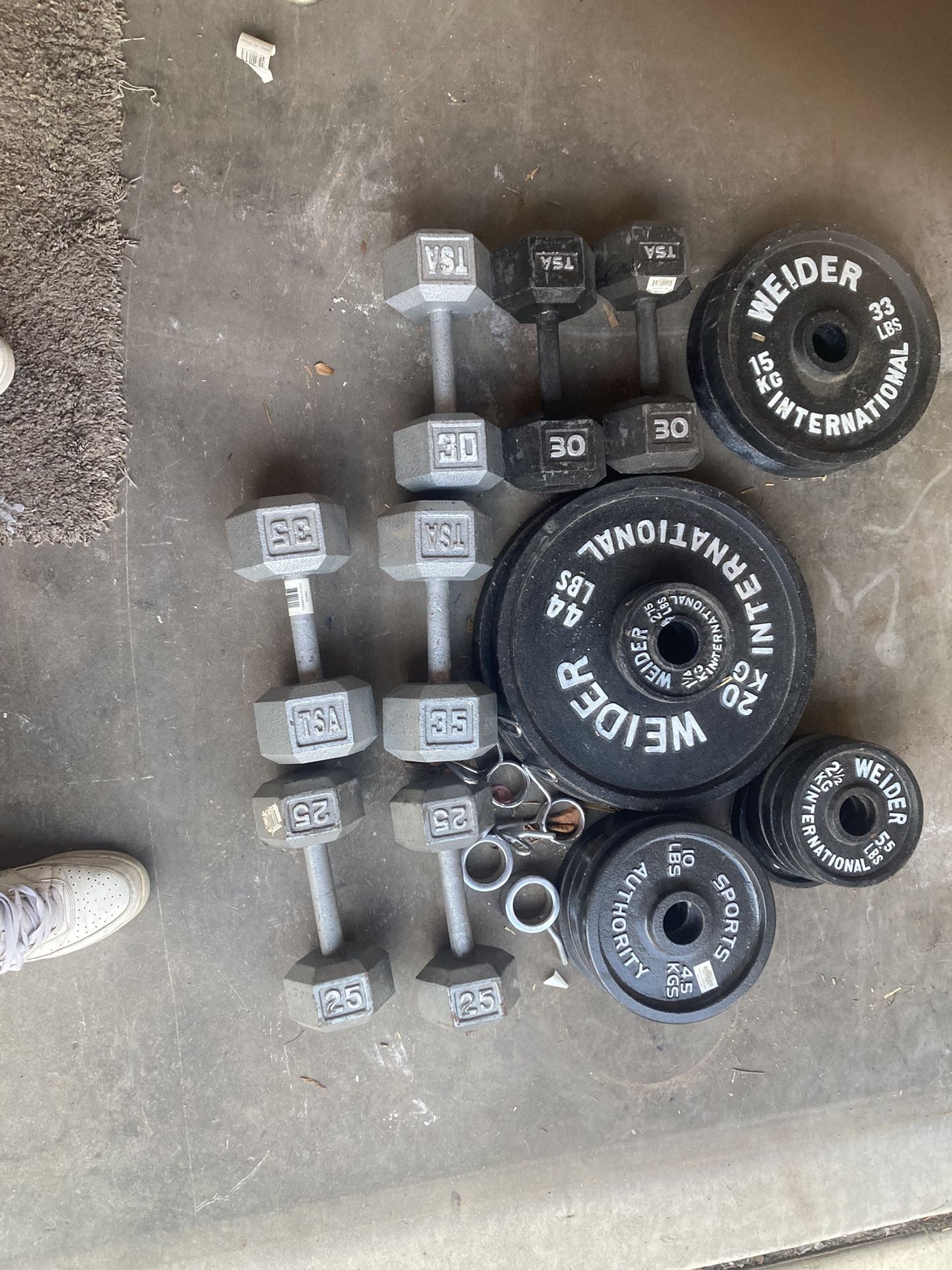 WEIDER OLYMPIC WEIGHTS/. $50-$150