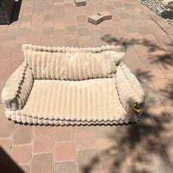 Tan comfy couch for medium size dog not used too small for my dog