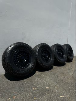 KMC KM552 IMS 8x180 18” Black Wheels With 35” Toyo Open Country AT3 All-Terrain Tires