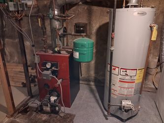 Oil boiler and gas water tank in perfect condition.