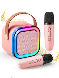 Mini karaoke speaker with 2 wireless microphones