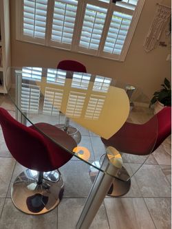 Triangular Glass Dining Table with 3 Adjustable Swivel Chairs - $75