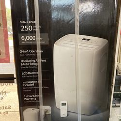 BRAND NEW LG 6,000 BTU Portable Air Conditioner Cools 250 Sq. Ft. with Dehumidifier in White