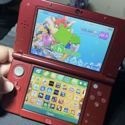 Loaded Red Nintendo “New” 3DS XL w/ Hshop + 128gb SD Card