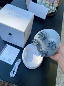 Scalp Massager box, device, charging cable, and user manual. $20