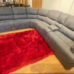 Winter Clearance Sale. Alejandra Gray Modular Reclining Sectional Only $1399. Easy Finance Option. Same-Day Delivery.