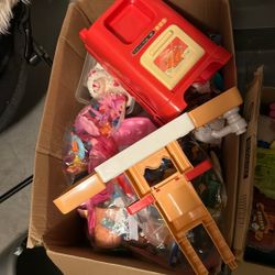 Two Boxes Of Some Random Toys And Kids Book