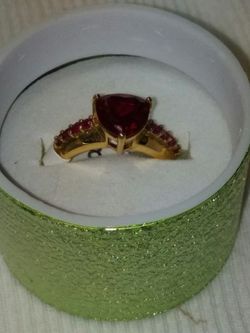 .925 Gold over sterling silver.