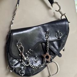 AUTHENTIC early 2000s y2k Dior pierced hardcore saddle shoulder bag in inky black leather