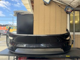 2025 TESLA MODEL Y FRONT BUMPER COVER OEM USED