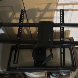 Wall mount for TV. Not sure of the brand.