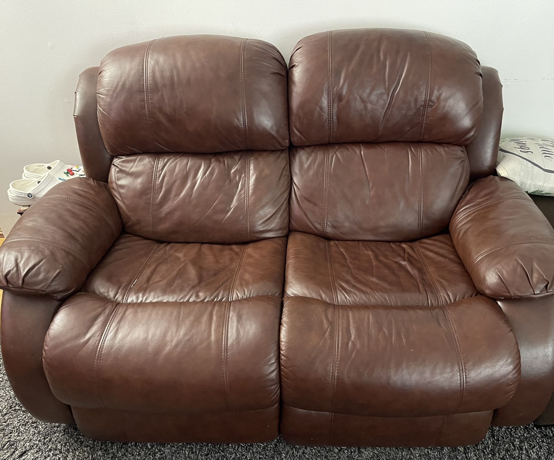 2 Leather Recliners $225.00 Each of OBO .