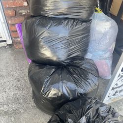 FREE - bags and bags and bags of women’s clothes zs M and Large - YES they are available