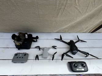 DJI Mini 2 And ZLRC SG906 Drones