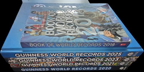 4 Guinness World Records Books and 1 Book of World Records